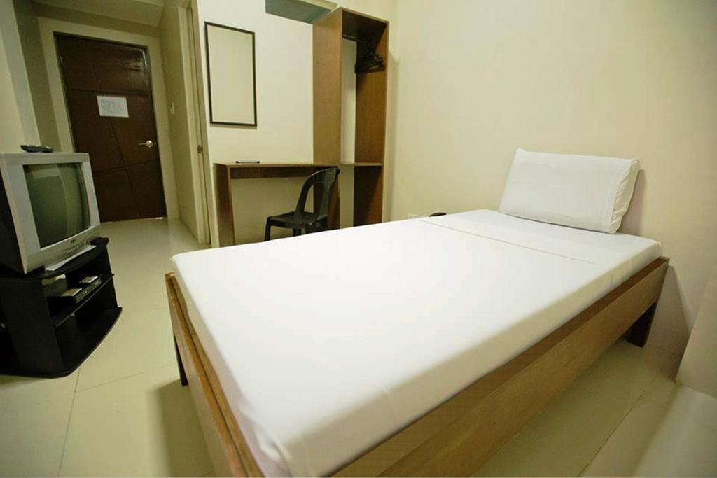 Travelbee Business Inn Cebu Stadt Zimmer foto